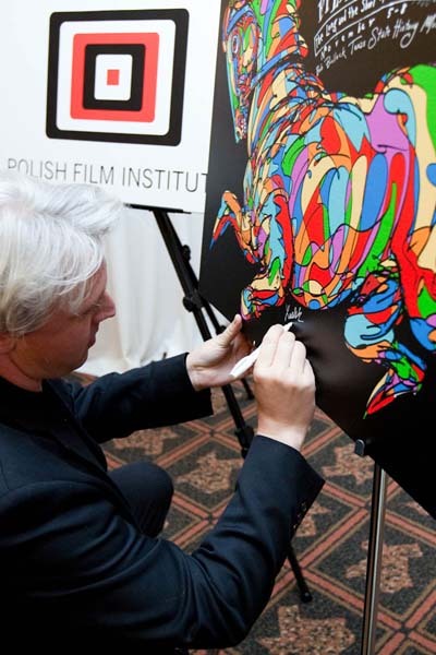 Composer Ludek Drizhal signs the canvas
