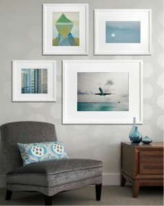 wall collage, displaying personal art, white framed collage