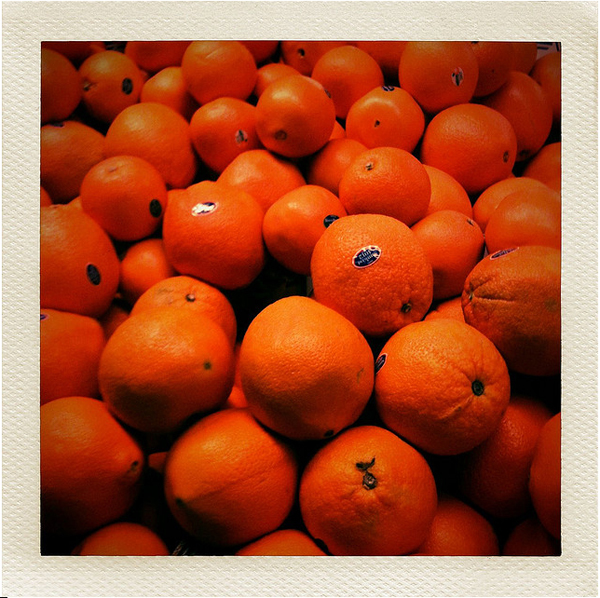 oranges at a grocery store, supermarket photography
